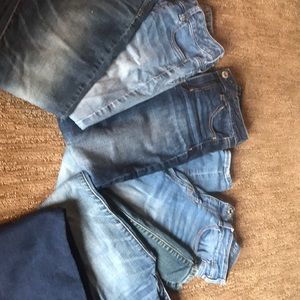 Six pairs of jeans.  2 short!